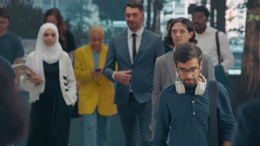 Smart City Surveillance System Using Facial Recognition and AI to Scan Pedestrians on a Crowded Sidewalk. Augmented Reality Interface Highlights Faces and Tracks Movement in Real Time