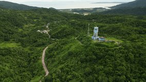 Dense Tropical Mountains Near PAGASA Virac Radar Station In Buenavista, Bato, Catanduanes, Philippines. Aerial Drone Shot - Powered by Shutterstock - Get 15% off with code: PIKWIZARD15