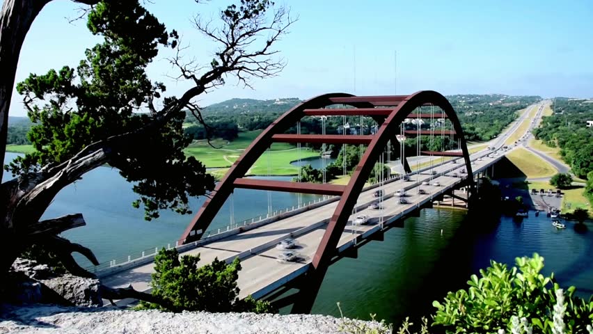 The pennybacker bridge over lake austin on a sunny day