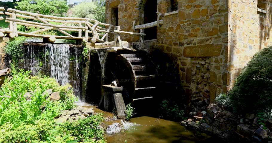 Static video of the Old Mill in Little Rock Arkansas. A water wheel and waterfall can be seen.