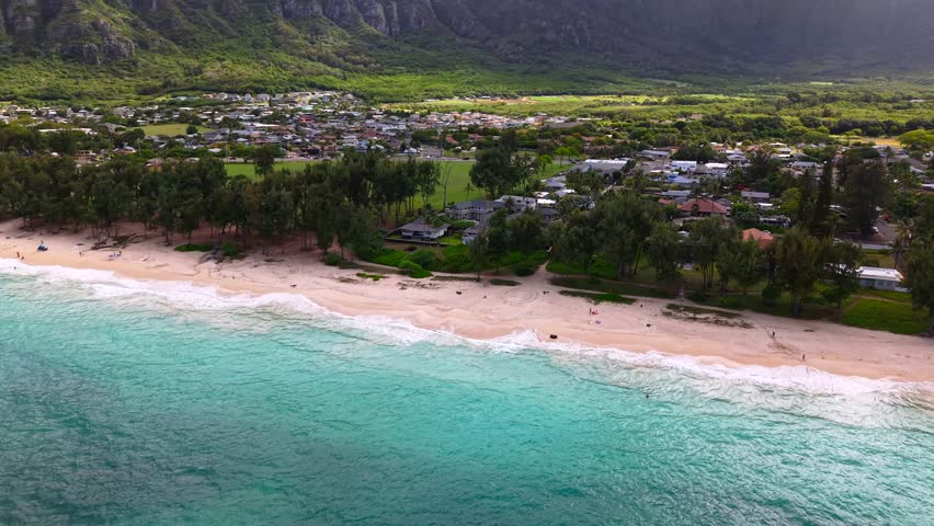 Waimānalo town on the coast of Oahu, Hawaii with Koolau mountains, aerial