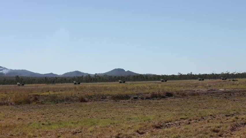 U.S., Australian, and partner forces conduct live fire missions.