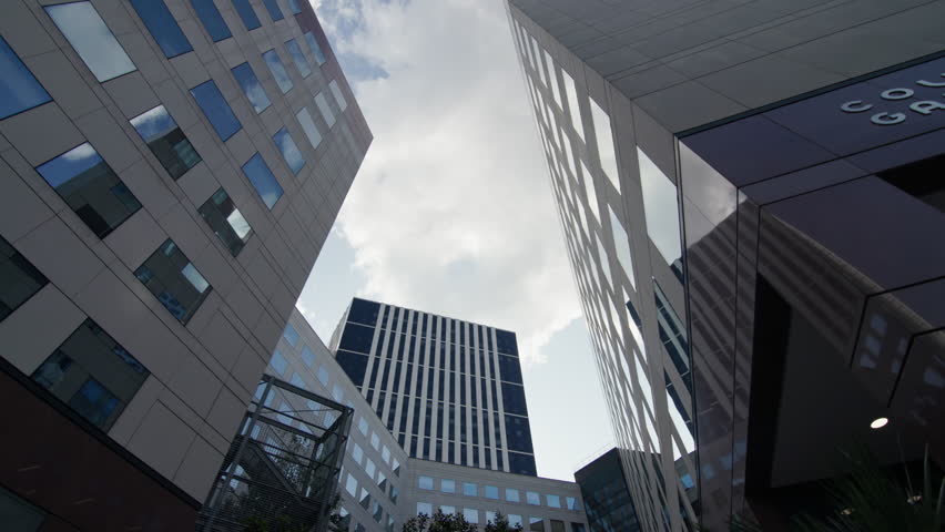 Contemporary skyline of Paris business district Courbevoie with modern architecture of tall corporate buildings and towers representing finance and economy