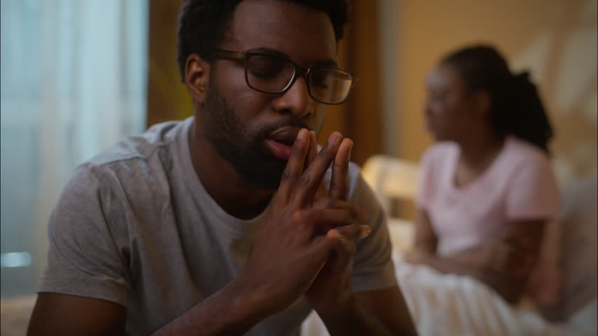 Family relationship crisis African American couple divorce frustrated embarrassed man boyfriend erectile dysfunction health problems infertility sex woman girlfriend ignoring at home bedroom evening