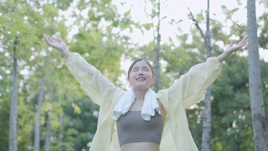 Asian women are healthy. They wake up early to exercise in the park. There are many trees that make them feel refreshed. Their favorite sports are running and yoga. Health care.