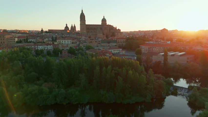 Aerial view of the historic cityscape of Salamanca at sunrise, Castilla y Leon, Spain. Medieval city, Salamanca Cathedral, Torre del Clavero, and the historic University. UNESCO World Heritage Site