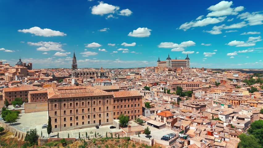 Aerial view of the historic cityscape of Toledo, Castilla-La Mancha, Spain. Beautiful medieval city with the Alcazar of Toledo, Cathedral de Santa Mari, UNESCO World Heritage Site.