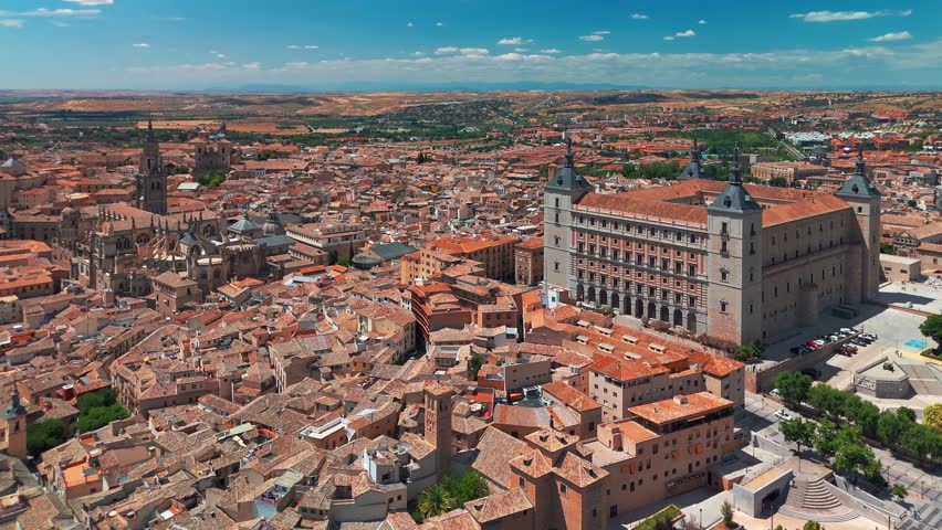 Aerial view of the historic cityscape of Toledo, Castilla-La Mancha, Spain. Beautiful medieval city with the Alcazar of Toledo, Cathedral de Santa Mari, UNESCO World Heritage Site.