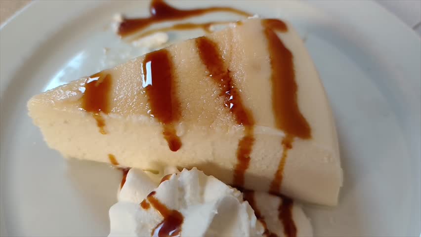 Creamy Caramel Cheesecake: A Delightful Dessert Dish of Rich Cheese and Syrup
