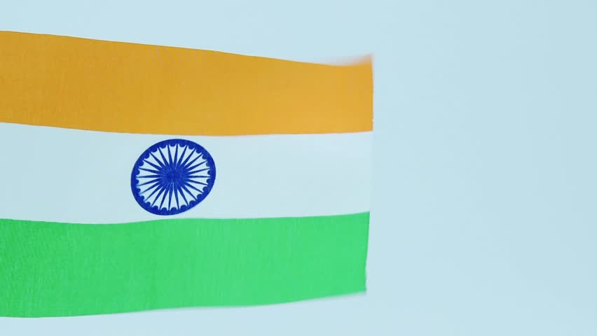 Indian table flag waving on white background, slow motion