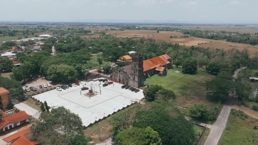 Aerial 4K Drone of Philippines Oldest Church, San Pablo Church Ruins, Isabela
iconic Baroque-style church,  blend of adobe, bricks, riverstones, and coral stones in its construction