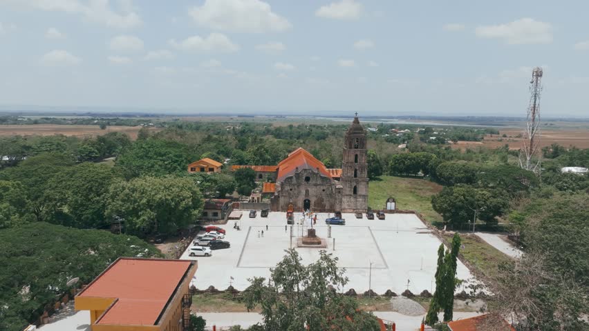 Aerial 4K Drone of Philippines Oldest Church, San Pablo Church Ruins, Isabela
iconic Baroque-style church,  blend of adobe, bricks, riverstones, and coral stones in its construction