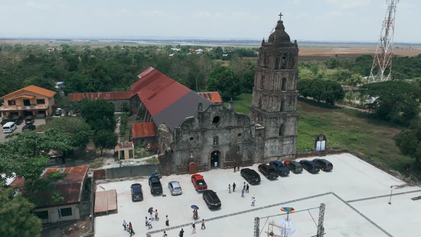 Aerial 4K Drone of Philippines Oldest Church, San Pablo Church Ruins, Isabela
iconic Baroque-style church,  blend of adobe, bricks, riverstones, and coral stones in its construction