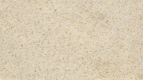 Ripples in clear beach water spreading across sand. One side captures the bubble impact, highlighting concentric rings and light refraction. Natural beauty in fluid motion - Powered by Shutterstock - Get 15% off with code: PIKWIZARD15