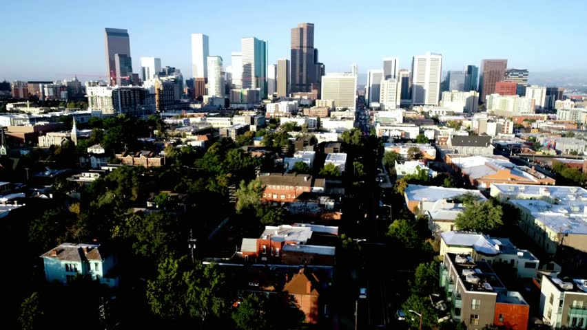 The denver colorado skyline rises above the urban landscape