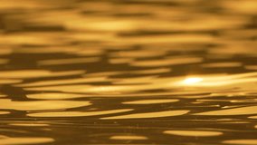 Water, golden, reflections, sun sparkles on tranquil rippling surface at sunset - Powered by Shutterstock - Get 15% off with code: PIKWIZARD15