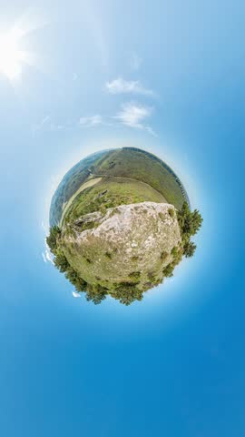Planet Earth Landscape Tiny World - A panoramic view of a rural landscape captured using a fisheye lens, creating a miniature planet effect.