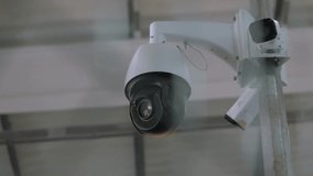 Black Surveillance Video Camera Turning To The Right Control Camera Rotation. - Powered by Shutterstock - Get 15% off with code: PIKWIZARD15