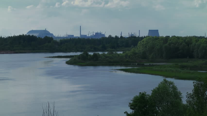 View from Pripyat rive. Chernobyl new safe confinement arch. Ukraine