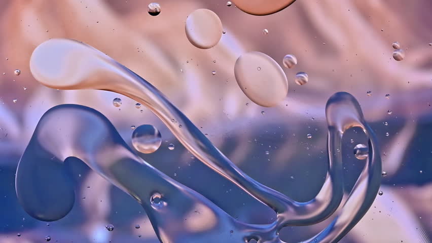 Abstract Colorful Organic Food Oil Drops Bubbles on Water