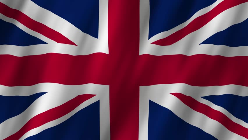 United Kingdom flag waving proudly at a sunny outdoor event