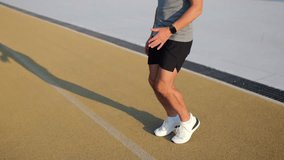 A young man vigorously performs a leg workout and jogging, paying special attention to physical fitness. - Powered by Shutterstock - Get 15% off with code: PIKWIZARD15