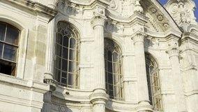 Close-Up Ortaköy Mosque Facade in Neo-Baroque Style with Folded Red Turkish Flag on Window Ledge. Sun Light Revealing Ornamental Architecture, Stone Texture, Historic Details, Symmetrical Composition. - Powered by Shutterstock - Get 15% off with code: PIKWIZARD15