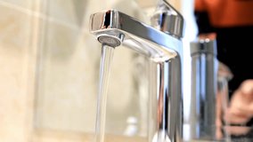 Wash hands in faucets with soap and water content to prevent the corona virus HD 4k - Powered by Shutterstock - Get 15% off with code: PIKWIZARD15