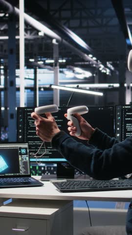 Vertical video Data center engineer using virtual reality, working on neural network software development. IT expert in server room using VR equipment, implementing machine learning technology, camera