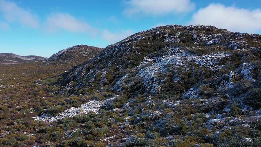 Fresh Snow on a Clear Sunny Day in the Central Highlands, Tasmania, Australia Aerial Drone 4K 
