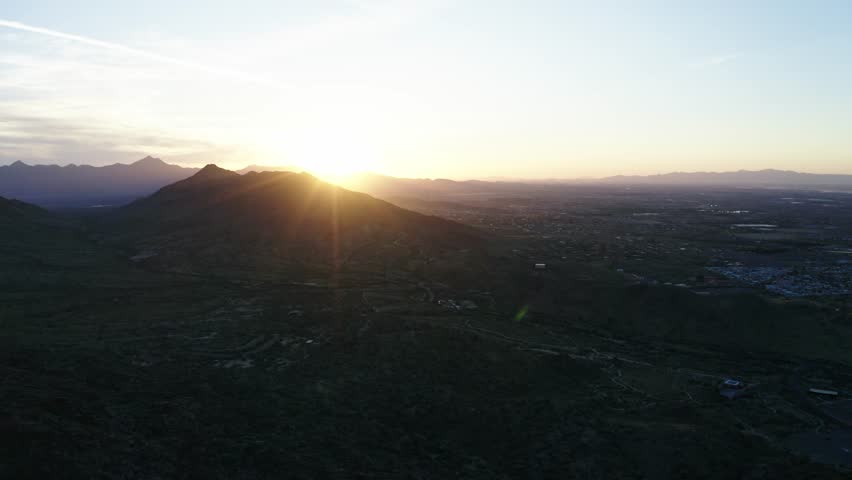 Lens flare over mountains around Phoenix, Arizona.