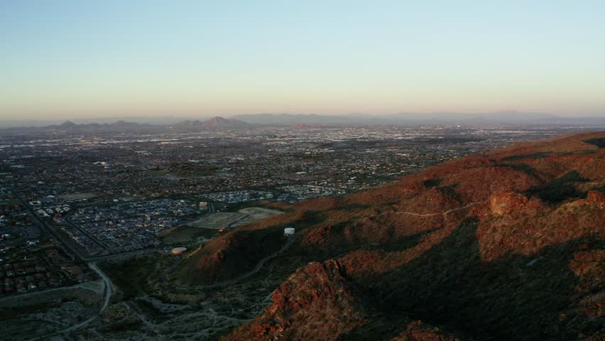 Mountains in Phoenix, Arizona connecting with sprawling neighborhoods.
