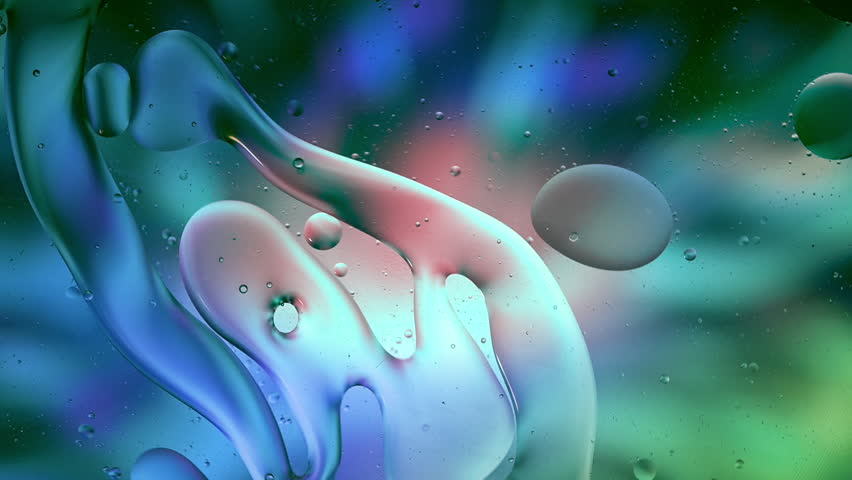 Abstract Colorful Organic Food Oil Drops Bubbles on Water