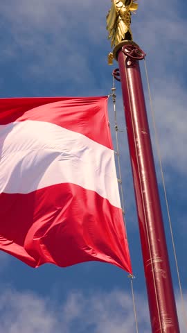  Austrian flag waving in the wind.The National Day of Austria 