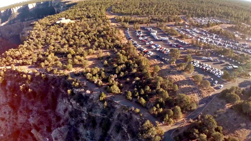 aerial drone view moving over the grand canyon formation. The Desert View Point. around United States, lands between red rocky cliffs