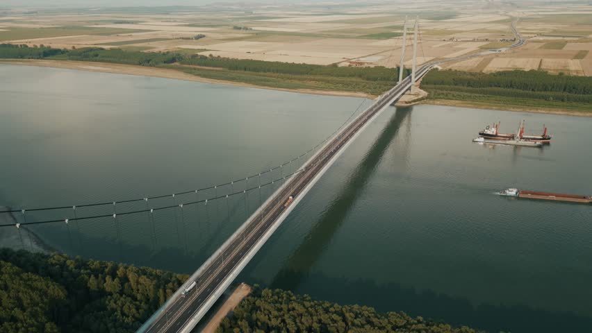Road Suspension Bridge Of Braila Over The Danube River In Galati, Romania. Aerial Drone Shot
