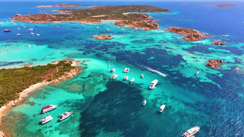 Isola Budelli. Arcipelago della Maddalena. Island Budelli. Sardinia, Italy. Beaches of Sardinia. Boats and yachts. Incredible colors and views. View from above. Drone view of Sardinia. Sea. Ocean.