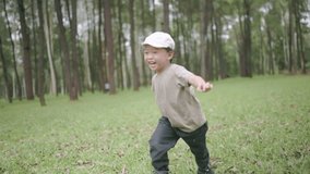 Candid moment of a happy child running and laughing in nature, expressing carefree joy, family love, and the essence of a slow, rural lifestyle. - Powered by Shutterstock - Get 15% off with code: PIKWIZARD15