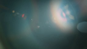 Real Shooted Cinematic Lens Flare and Particle Overlay on Black Background at 1000fps Slow Motion. - Powered by Shutterstock - Get 15% off with code: PIKWIZARD15