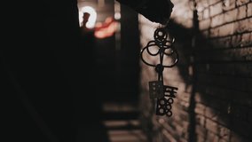 Rescue. Salvation. Release from prison. A man's hand carries a key to free a girl. The concept of Carmen's opera - Powered by Shutterstock - Get 15% off with code: PIKWIZARD15