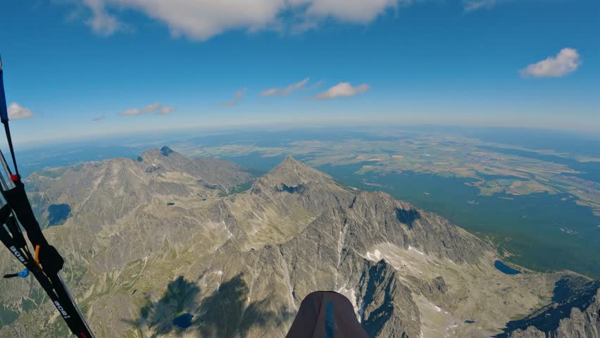Paragliding POV Flying Freedom Over Rocky Alpine Mountains