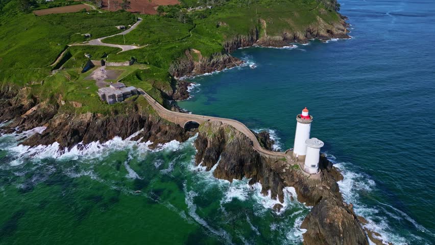 Amazing descending drone movement to the coastal Petit Minou lighthouse aka Phare du Petit Minou in Plouzané, Finistère, Brittany, France.