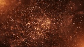 Glowing hot fiery particles abstract background with golden bokeh light and shallow depth of field. This warm glittering motion background animation is full HD and a seamless loop. - Powered by Shutterstock - Get 15% off with code: PIKWIZARD15