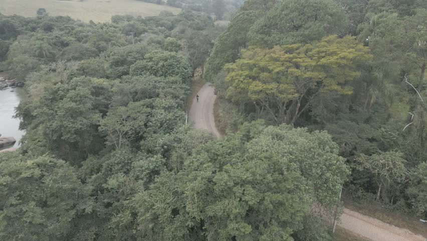 Nature Park Hiking Trail Dirt Road Trail Running Mountain Biking Countryside Rural Landscape Small Town Forest Path Outdoor Adventure Scenic Route Gravel Road Natural Beauty Sunrise Hike Trail Runner