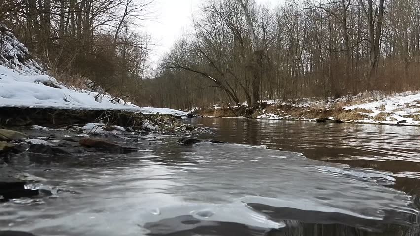 Cold snowy day in Ohio by the river