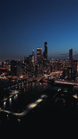 Experience Chicago breathtaking sights through aerial footage of its vibrant lights, stunning skyline, and beautiful architecture that transform this metropolis into a magical night destination