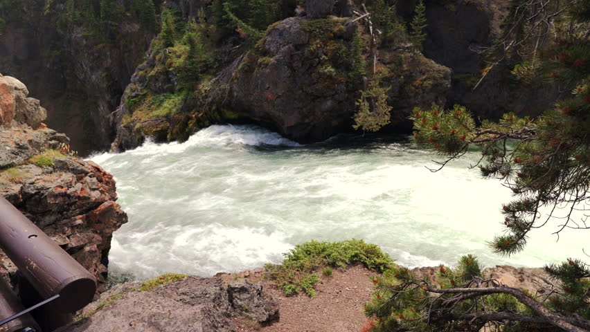 Come and explore the breathtaking Lower Falls in Yellowstone National Park, where you can witness the majestic Grand Canyon along with the stunning natural beauty that Wyoming has to offer
