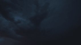 Dramatic lightning bolts light up the night sky during an intense stormfront, captured on camera as electric flashes illuminate dark clouds and reveal the storm’s raw power - Powered by Shutterstock - Get 15% off with code: PIKWIZARD15