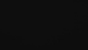 Night thunderstorm footage captures repeated cloud-to-ground lightning strikes, lighting up the dark sky with powerful bolts and showcasing the intensity of severe nighttime weather - Powered by Shutterstock - Get 15% off with code: PIKWIZARD15