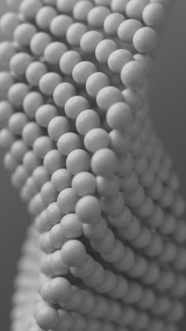 Abstract 3D loop white spheres arranged in a Mobius shape, rotating continuously. Soft focus and close-up view add depth and a futuristic touch.